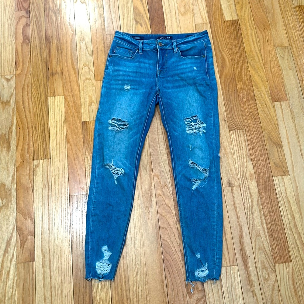 Skinny low rise distressed jeans